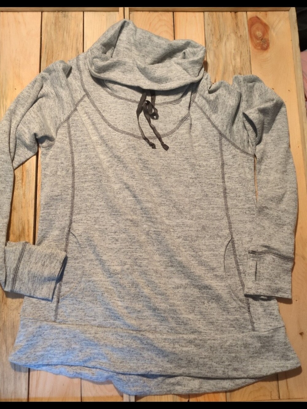 Kuhl long sleeve pullover with front pockets and thumb holes